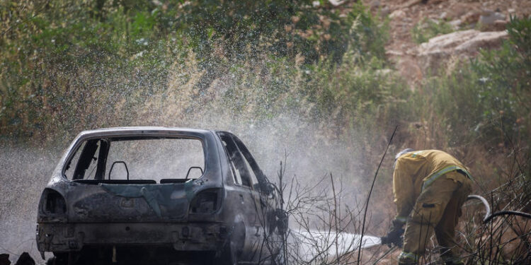 רכב שהוצת צילום: פלאש 90