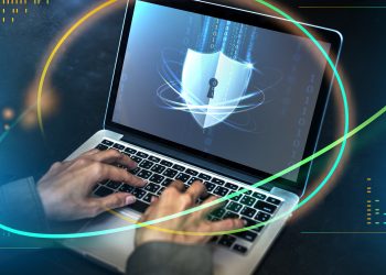 hands typing on a laptop with security shield 2026 01 07 23 24 09 utc